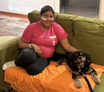 14 year-old Nataly with Therapy Dog at Seattle Ronald McDonald House