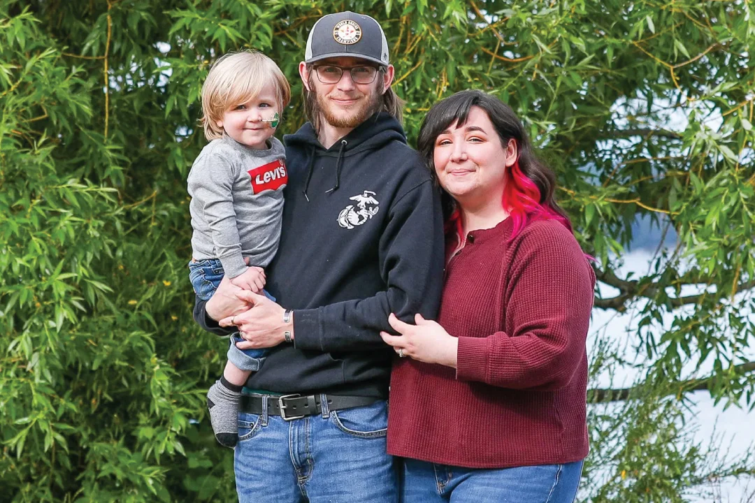 Oliver DeLatin and his mother and father