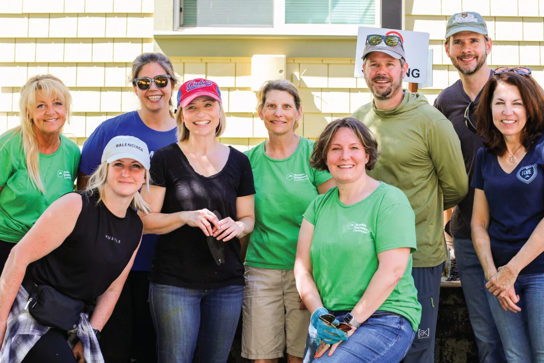 group of volunteers smiling together